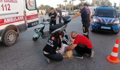 Kadın motosiklet sürücüsünü kaskı hayatta tuttu